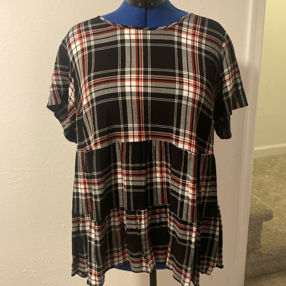 Women’s Torrid black plaid top.